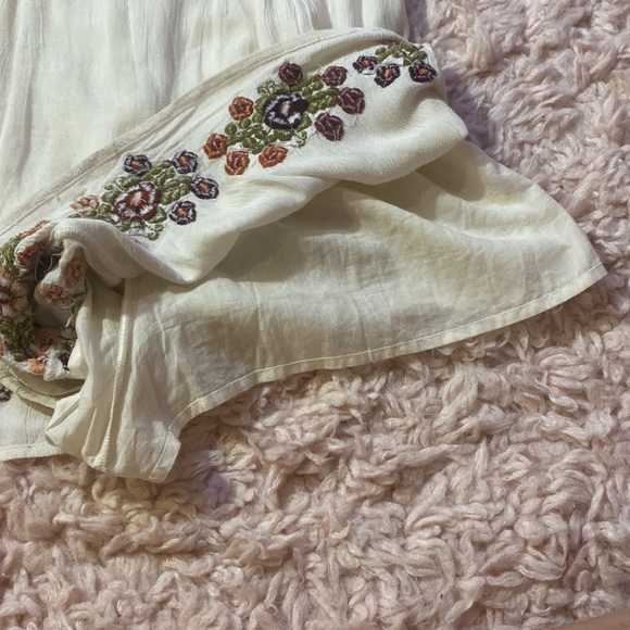 Tularosa Rowley Romper in cream with embroidery flowers - Picture 11 of 12